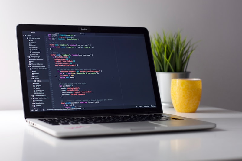 Laptop workspace with productivity tools and project management software